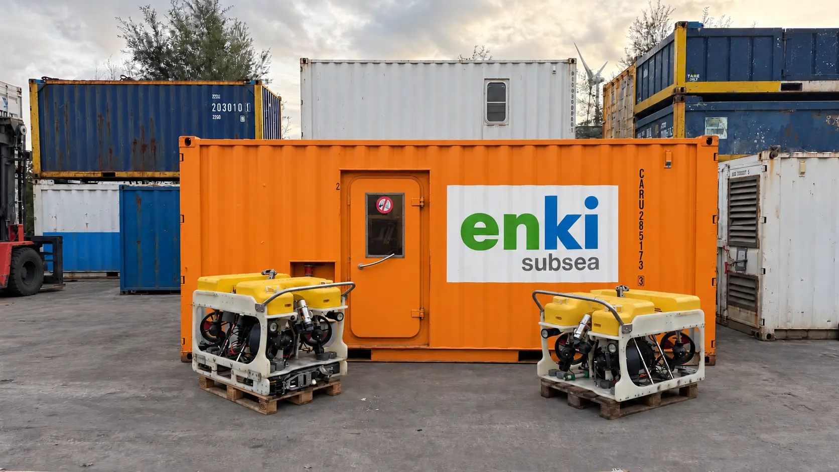 Two Seaeye Cougar XT Compact ROVs beside an Enki Subsea container